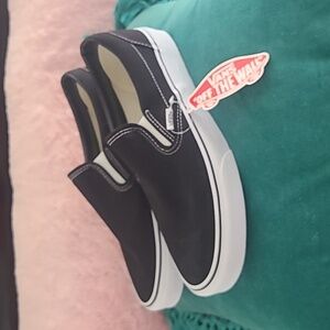 Vans black slip in sneakers